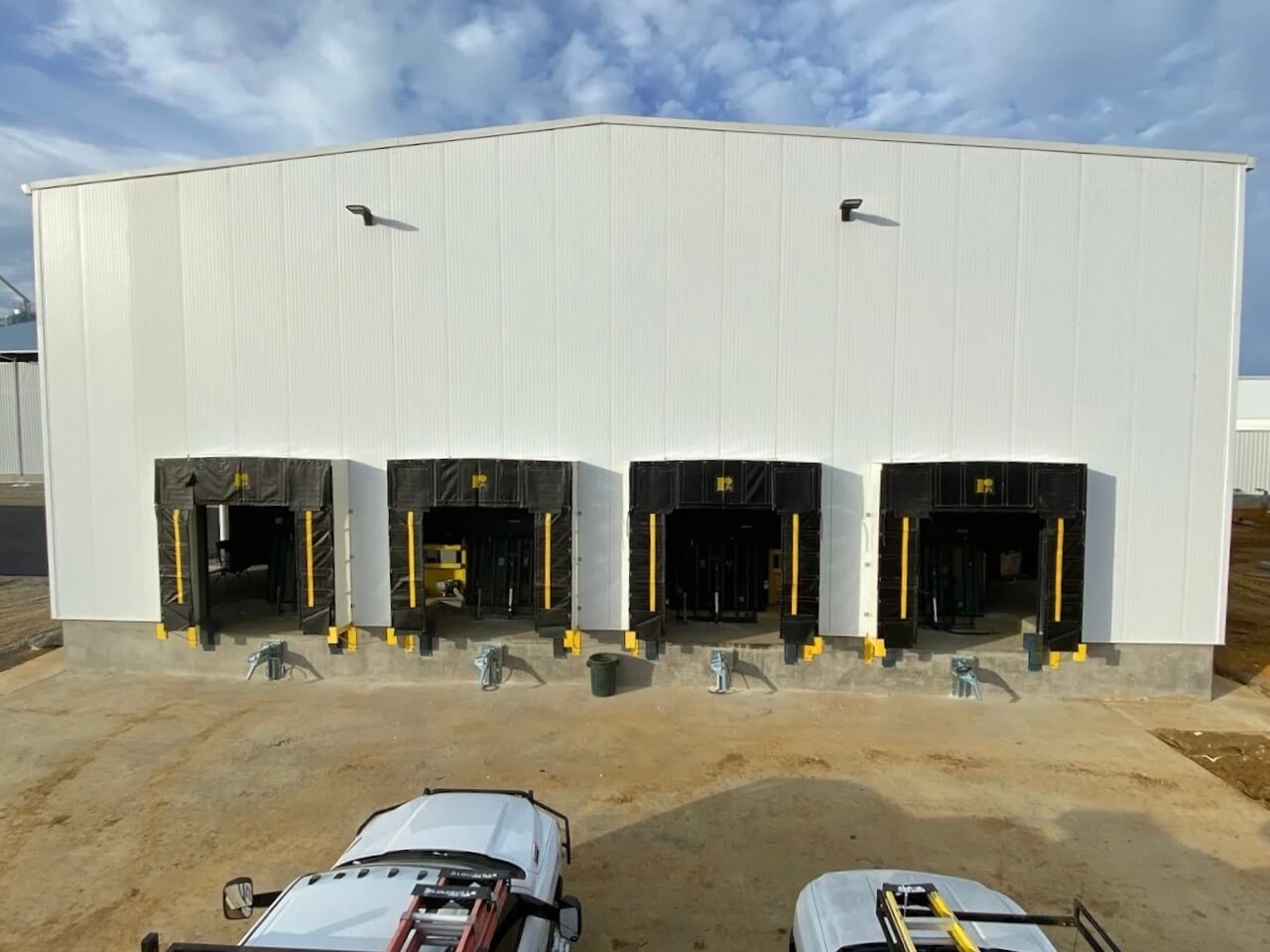 Commercial warehouse with multiple loading dock bays and equipment